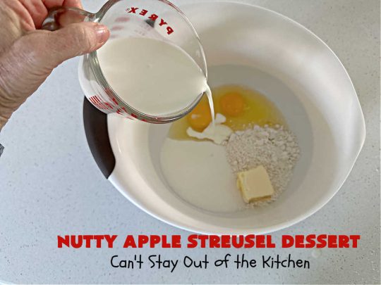 Nutty Apple Streusel Dessert | Can't Stay Out off the Kitchen | this is a fantastic old-world #vintage #dessert #recipe that's half #streusel & half #cobbler. The #apples spice things up & #Bisquick makes it easier to toss together. This #AppleDessert can also be made in the #SlowCooker. Top with #IceCream & everyone will be more than satisfied! #crockpot #almonds #AppleCobbler #NuttyAppleStreuselDessert