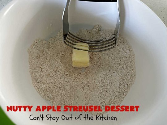 Nutty Apple Streusel Dessert | Can't Stay Out off the Kitchen | this is a fantastic old-world #vintage #dessert #recipe that's half #streusel & half #cobbler. The #apples spice things up & #Bisquick makes it easier to toss together. This #AppleDessert can also be made in the #SlowCooker. Top with #IceCream & everyone will be more than satisfied! #crockpot #almonds #AppleCobbler #NuttyAppleStreuselDessert