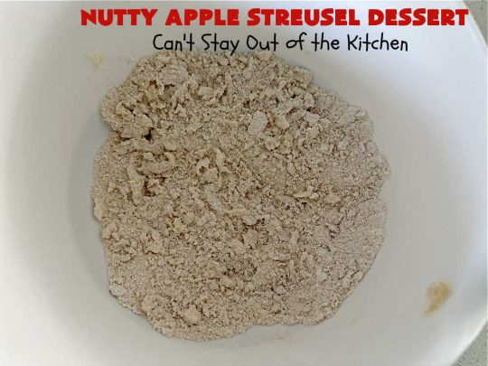 Nutty Apple Streusel Dessert | Can't Stay Out off the Kitchen | this is a fantastic old-world #vintage #dessert #recipe that's half #streusel & half #cobbler. The #apples spice things up & #Bisquick makes it easier to toss together. This #AppleDessert can also be made in the #SlowCooker. Top with #IceCream & everyone will be more than satisfied! #crockpot #almonds #AppleCobbler #NuttyAppleStreuselDessert