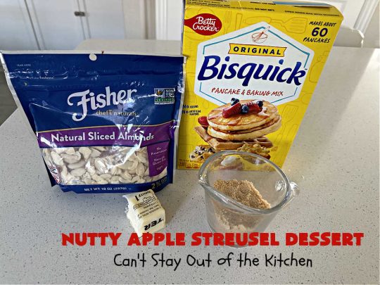 Nutty Apple Streusel Dessert | Can't Stay Out off the Kitchen | this is a fantastic old-world #vintage #dessert #recipe that's half #streusel & half #cobbler. The #apples spice things up & #Bisquick makes it easier to toss together. This #AppleDessert can also be made in the #SlowCooker. Top with #IceCream & everyone will be more than satisfied! #crockpot #almonds #AppleCobbler #NuttyAppleStreuselDessert