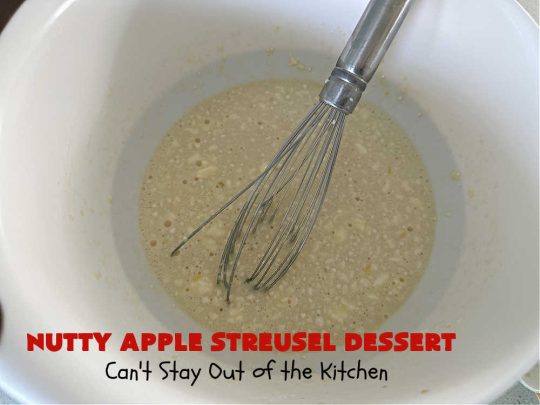 Nutty Apple Streusel Dessert | Can't Stay Out off the Kitchen | this is a fantastic old-world #vintage #dessert #recipe that's half #streusel & half #cobbler. The #apples spice things up & #Bisquick makes it easier to toss together. This #AppleDessert can also be made in the #SlowCooker. Top with #IceCream & everyone will be more than satisfied! #crockpot #almonds #AppleCobbler #NuttyAppleStreuselDessert