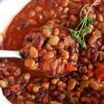 Partytime Beans | Can't Stay Out of the Kitchen | this easy #SlowCooker #recipe for #BakedBeans is so effortless since everything is tossed into the #crockpot! Start it earlier in the day & it's ready in time for #dinner with #hamburgers or #HotDogs on the #grill. It uses 5 types of #beans & is #vegan as well as #GlutenFree. #potluck #BackyardBarbecues #tailgating #PartytimeBeans