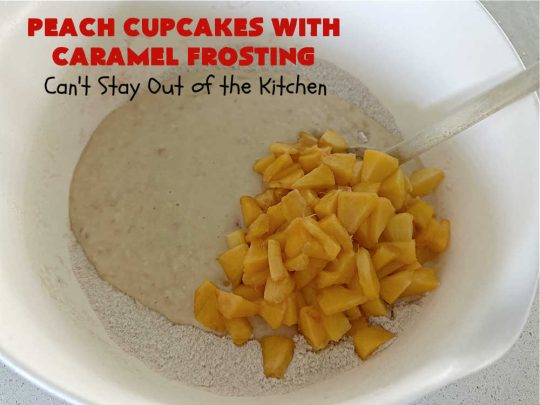 Peach Cupcakes with Caramel Frosting | Can't Stay Out of the Kitchen | these fabulous #cupcakes include fresh #peaches, #applesauce & #bananas in the batter. Then they're topped with a dreamy #CaramelFrosting. You'll be captivated and swooning over every bite. #dessert #PeachDessert #PeachCupcakes #PeachCupcakesWithCaramelFrosting