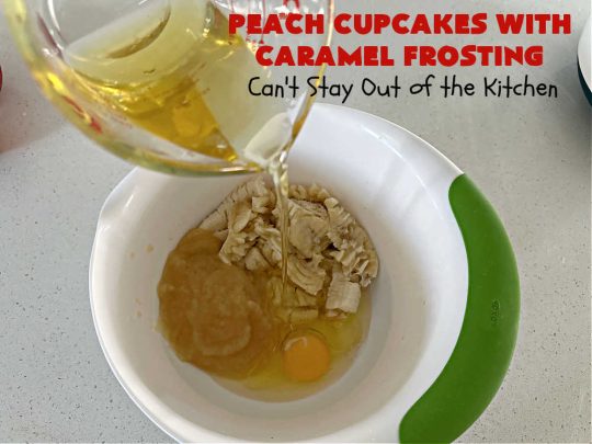 Peach Cupcakes with Caramel Frosting | Can't Stay Out of the Kitchen | these fabulous #cupcakes include fresh #peaches, #applesauce & #bananas in the batter. Then they're topped with a dreamy #CaramelFrosting. You'll be captivated and swooning over every bite. #dessert #PeachDessert #PeachCupcakes #PeachCupcakesWithCaramelFrosting