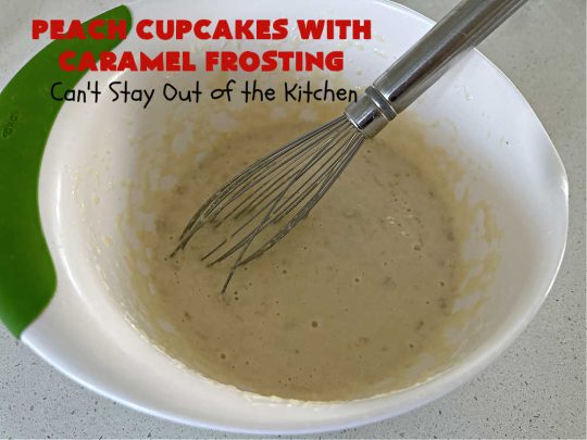 Peach Cupcakes with Caramel Frosting | Can't Stay Out of the Kitchen | these fabulous #cupcakes include fresh #peaches, #applesauce & #bananas in the batter. Then they're topped with a dreamy #CaramelFrosting. You'll be captivated and swooning over every bite. #dessert #PeachDessert #PeachCupcakes #PeachCupcakesWithCaramelFrosting