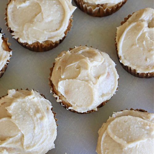 Peach Cupcakes with Caramel Frosting | Can't Stay Out of the Kitchen | these fabulous #cupcakes include fresh #peaches, #applesauce & #bananas in the batter. Then they're topped with a dreamy #CaramelFrosting. You'll be captivated and swooning over every bite. #dessert #PeachDessert #PeachCupcakes #PeachCupcakesWithCaramelFrosting