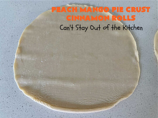 Peach Mango Pie Crust Cinnamon Rolls | Can't Stay Out of the Kitchen | These irresistible sweet treats contain a #PeachMango #fruit spread that's out of this world. This easy #5Ingredient #recipe can be whipped up in a jiffy. Terrific for #breakfast, #brunch or #tailgating snacks. If you enjoy #CinnamonRolls you'll love these little treasures. #cinnamon #PieCrust #PieCrustCinnamonRolls #PeachMangoPieCrustCinnamonRolls