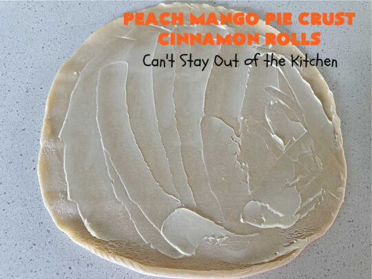 Peach Mango Pie Crust Cinnamon Rolls | Can't Stay Out of the Kitchen | These irresistible sweet treats contain a #PeachMango #fruit spread that's out of this world. This easy #5Ingredient #recipe can be whipped up in a jiffy. Terrific for #breakfast, #brunch or #tailgating snacks. If you enjoy #CinnamonRolls you'll love these little treasures. #cinnamon #PieCrust #PieCrustCinnamonRolls #PeachMangoPieCrustCinnamonRolls