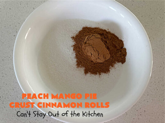 Peach Mango Pie Crust Cinnamon Rolls | Can't Stay Out of the Kitchen | These irresistible sweet treats contain a #PeachMango #fruit spread that's out of this world. This easy #5Ingredient #recipe can be whipped up in a jiffy. Terrific for #breakfast, #brunch or #tailgating snacks. If you enjoy #CinnamonRolls you'll love these little treasures. #cinnamon #PieCrust #PieCrustCinnamonRolls #PeachMangoPieCrustCinnamonRolls