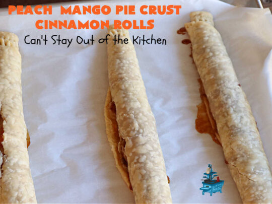 Peach Mango Pie Crust Cinnamon Rolls | Can't Stay Out of the Kitchen | These irresistible sweet treats contain a #PeachMango #fruit spread that's out of this world. This easy #5Ingredient #recipe can be whipped up in a jiffy. Terrific for #breakfast, #brunch or #tailgating snacks. If you enjoy #CinnamonRolls you'll love these little treasures. #cinnamon #PieCrust #PieCrustCinnamonRolls #PeachMangoPieCrustCinnamonRolls