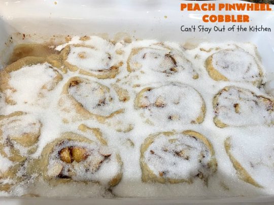 Peach Pinwheel Cobbler | Can't Stay Out of the Kitchen | this is one fantastic #PeachCobbler! #Peaches are wrapped up in dough pinwheel fashion. Syrup is poured over top before baking. The pinwheels absorb the syrup & puff up really large. This is absolutely heavenly. Wonderful #summer #dessert. #PeachDessert #cobbler #PeachPinwheelCobbler #Canbassador #WashingtonStateFruitCommission #WashingtonStoneFruitGrowers #WashingtonStateStoneFruitGrowers