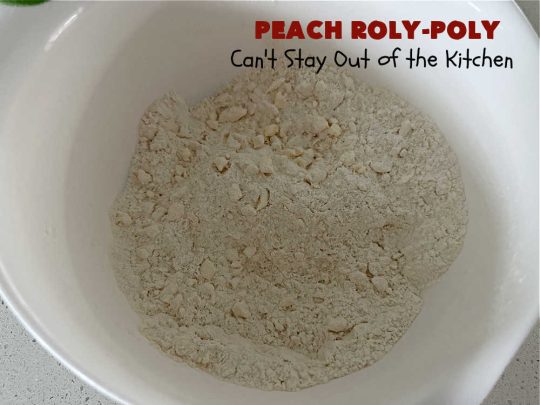 Peach Roly-Poly | Can't Stay Out of the Kitchen | This delicious #peach #dessert is half #PeachCobbler & half #PeachDumplings! #Peaches & #Cinnamon are an unbeatable combination & flavor the #pinwheels or #RolyPolys in this scrumptious #dessert. Best served right out of the oven with #IceCream. #PeachDessert #PeachRolyPoly