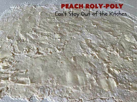 Peach Roly-Poly | Can't Stay Out of the Kitchen | This delicious #peach #dessert is half #PeachCobbler & half #PeachDumplings! #Peaches & #Cinnamon are an unbeatable combination & flavor the #pinwheels or #RolyPolys in this scrumptious #dessert. Best served right out of the oven with #IceCream. #PeachDessert #PeachRolyPoly