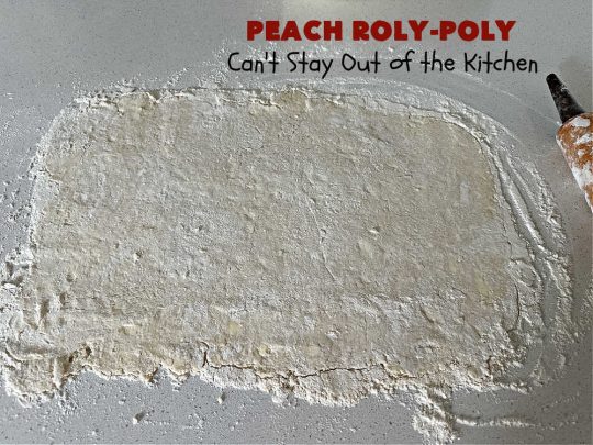 Peach Roly-Poly | Can't Stay Out of the Kitchen | This delicious #peach #dessert is half #PeachCobbler & half #PeachDumplings! #Peaches & #Cinnamon are an unbeatable combination & flavor the #pinwheels or #RolyPolys in this scrumptious #dessert. Best served right out of the oven with #IceCream. #PeachDessert #PeachRolyPoly