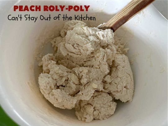 Peach Roly-Poly | Can't Stay Out of the Kitchen | This delicious #peach #dessert is half #PeachCobbler & half #PeachDumplings! #Peaches & #Cinnamon are an unbeatable combination & flavor the #pinwheels or #RolyPolys in this scrumptious #dessert. Best served right out of the oven with #IceCream. #PeachDessert #PeachRolyPoly