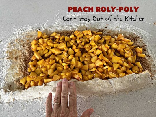 Peach Roly-Poly | Can't Stay Out of the Kitchen | This delicious #peach #dessert is half #PeachCobbler & half #PeachDumplings! #Peaches & #Cinnamon are an unbeatable combination & flavor the #pinwheels or #RolyPolys in this scrumptious #dessert. Best served right out of the oven with #IceCream. #PeachDessert #PeachRolyPoly