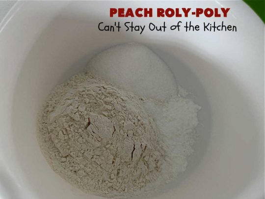 Peach Roly-Poly | Can't Stay Out of the Kitchen | This delicious #peach #dessert is half #PeachCobbler & half #PeachDumplings! #Peaches & #Cinnamon are an unbeatable combination & flavor the #pinwheels or #RolyPolys in this scrumptious #dessert. Best served right out of the oven with #IceCream. #PeachDessert #PeachRolyPoly
