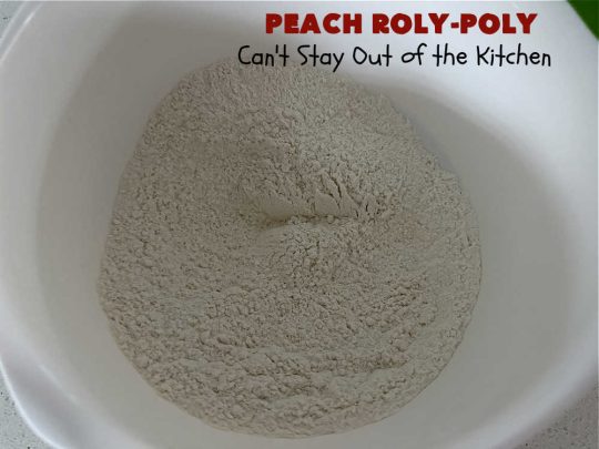 Peach Roly-Poly | Can't Stay Out of the Kitchen | This delicious #peach #dessert is half #PeachCobbler & half #PeachDumplings! #Peaches & #Cinnamon are an unbeatable combination & flavor the #pinwheels or #RolyPolys in this scrumptious #dessert. Best served right out of the oven with #IceCream. #PeachDessert #PeachRolyPoly