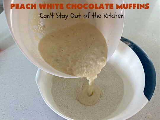 Peach White Chocolate Muffins | Can't Stay Out of the Kitchen | these delectable #muffins are "knock-your-socks-off" good! Every bite is filled with fresh #peaches, #WhiteChocolateChips, #bananas, #applesauce, #cinnamon & #nutmeg. #Chocolate & #FreshPeaches go so well together. Excellent option for #breakfast or #brunch #menus. #holiday #HolidayBreakfast #PeachWhiteChocolateMuffins