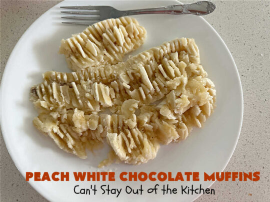 Peach White Chocolate Muffins | Can't Stay Out of the Kitchen | these delectable #muffins are "knock-your-socks-off" good! Every bite is filled with fresh #peaches, #WhiteChocolateChips, #bananas, #applesauce, #cinnamon & #nutmeg. #Chocolate & #FreshPeaches go so well together. Excellent option for #breakfast or #brunch #menus. #holiday #HolidayBreakfast #PeachWhiteChocolateMuffins