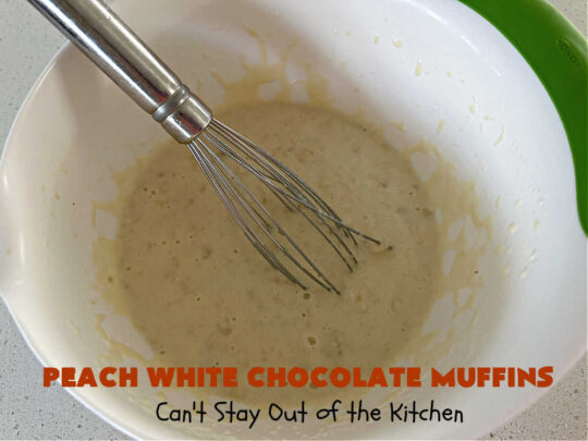 Peach White Chocolate Muffins | Can't Stay Out of the Kitchen | these delectable #muffins are "knock-your-socks-off" good! Every bite is filled with fresh #peaches, #WhiteChocolateChips, #bananas, #applesauce, #cinnamon & #nutmeg. #Chocolate & #FreshPeaches go so well together. Excellent option for #breakfast or #brunch #menus. #holiday #HolidayBreakfast #PeachWhiteChocolateMuffins