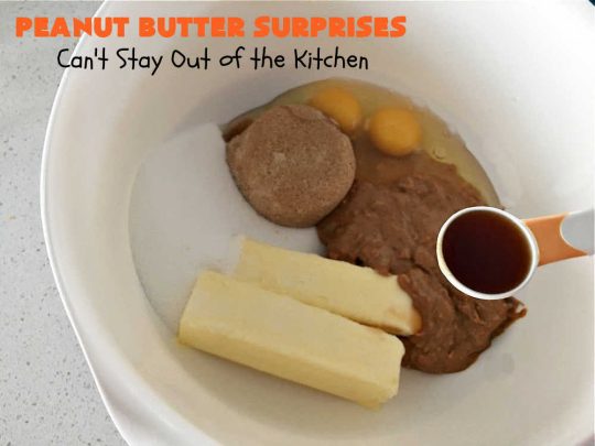 Peanut Butter Surprises | Can't Stay Out of the Kitchen | Surprise your family with these amazing #cookies. They're chocked full of #PeanutButter & #ReesesPeanutButterCups. Every bite will rock your world! Great for #tailgating or #holiday parties. #chocolate #dessert #ChocolateDessert #PeanutButterDessert #HolidayDessert #ReesesPeanutButterCupsDessert #PeanutButterSurprises