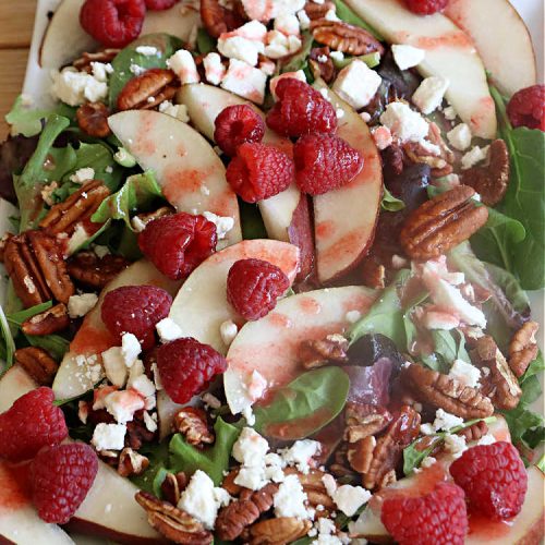 Pecan Pear Tossed Salad | Can't Stay Out of the Kitchen | this festive & elegant #TossedSaladWithFruit is marvelous to the taste buds. The #raspberries & #pears add sweetness & the #FetaCheese & toasted #pecans provide a savory crunchiness that balances the #salad wonderfully. It's so easy to whip up making it perfect for weeknight dinners, company meals or even #holidays. Your family will be captivated after just one bite! #TossedSalad #GlutenFree #PecanPearTossedSalad