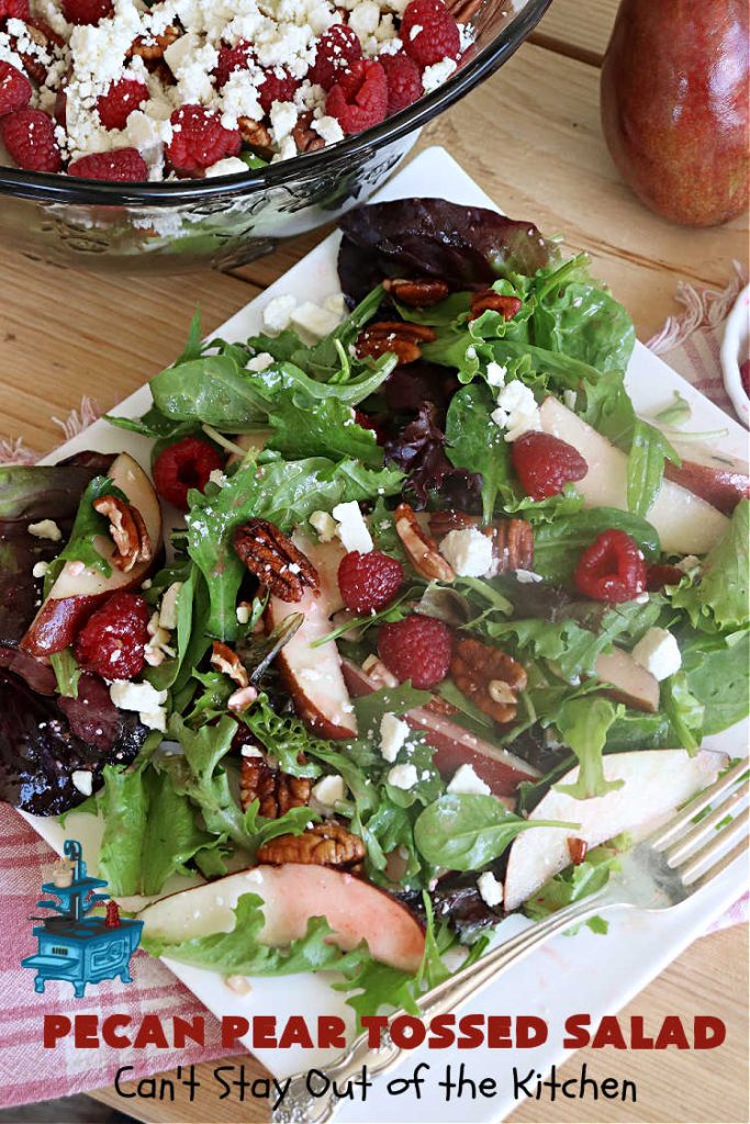 Pecan Pear Tossed Salad | Can't Stay Out of the Kitchen | this festive & elegant #TossedSaladWithFruit is marvelous to the taste buds. The #raspberries & #pears add sweetness & the #FetaCheese & toasted #pecans provide a savory crunchiness that balances the #salad wonderfully. It's so easy to whip up making it perfect for weeknight dinners, company meals or even #holidays. Your family will be captivated after just one bite! #TossedSalad #GlutenFree #PecanPearTossedSalad