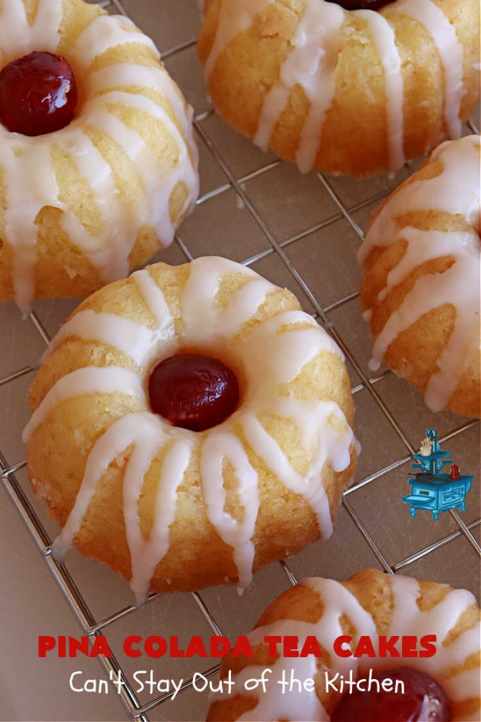 Pina Colada Tea Cakes | Can't Stay Out of the Kitchen | these scrumptious #TeaCakes are packed with #PinaColada flavor including a #Pineapple cake mix, pineapple gelatin, vanilla chips & #coconut. They're glazed with a luscious powdered sugar icing too. These miniature #Bundt #cakes are marvelous for #holiday or #Christmas baking. #HolidayDessert #PinaColadaDessert #PinaColadaTeaCakes