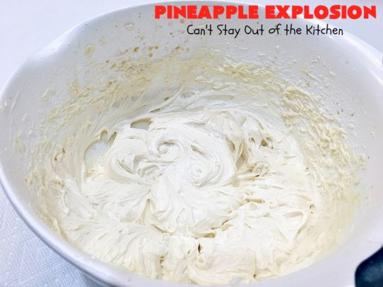 Pineapple Explosion | Can't Stay Out of the Kitchen | get quadruple the #pineapple whammy with #PineappleCakeMix & #PineapplePieFilling in the #cake & #PineappleExtract & #PineappleTidbits in the luscious #CreamCheese icing! Knock the socks off your company with this amazing #dessert! #Holiday #HolidayDessert #PineappleDessert #PineappleSheetCake #PineappleExplosion #PineappleExplosionCake