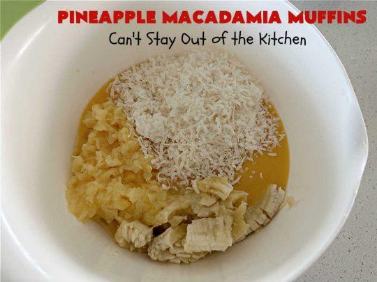 Pineapple Macadamia Muffins | Can't Stay Out of the Kitchen | these scrumptious #muffins will knock our socks off! They include crushed #pineapple, #bananas, #coconut #cinnamon & #MacadamiaNuts for the topping. They're easy to whip up, & great to make for a weekend, company or #holiday #breakfast. They freeze well if you need to make them in advance. #PineappleMacadamiaMuffins