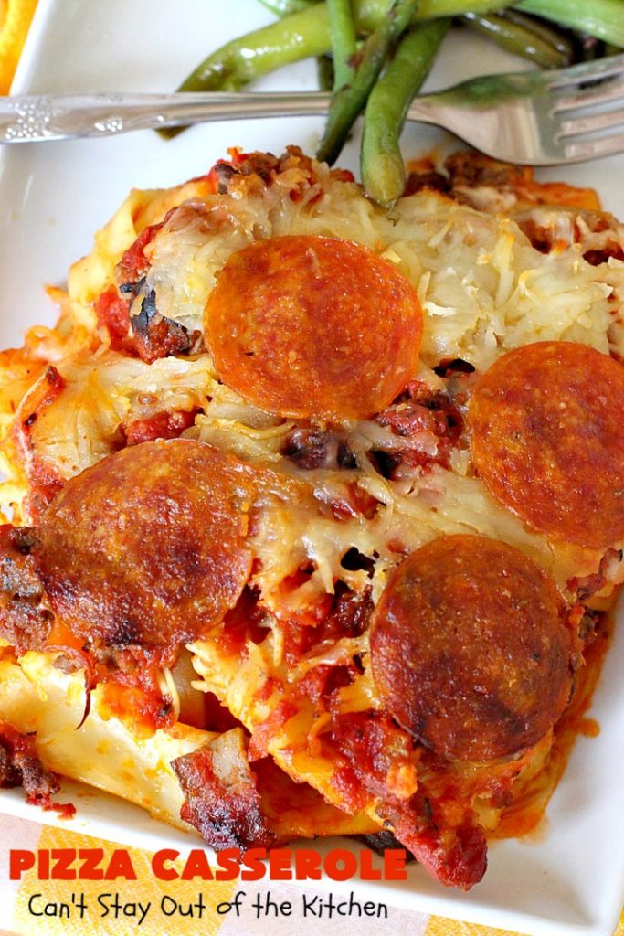 Ten Layer Pizza Casserole | Can't Stay Out of the Kitchen | This fantastic #casserole tastes like eating #pizza or #lasagna. It's filled with #GroundBeef, #noodles, #pepperoni #RicottaCheese, #Mozzarella Cheese & amped up #SpaghettiSauce. Our company raved over this #Italian #MainDish. #PizzaCasserole #TenLayerPizzaCasserole