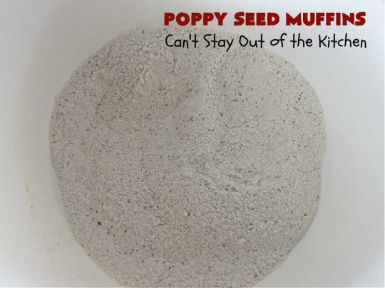 Poppy Seed Muffins | Can't Stay Out of the Kitchen | these delightful #muffins explode with flavor by using #AlmondExtract, #VanillaExtract, #ButterFlavoring & #PoppySeeds. Every bite will cure your sweet tooth cravings! Great for a weekend, company or #holiday #breakfast, #tailgating parties, backyard barbecues, or family picnics. These muffins travel & freeze well. #PoppySeedMuffins