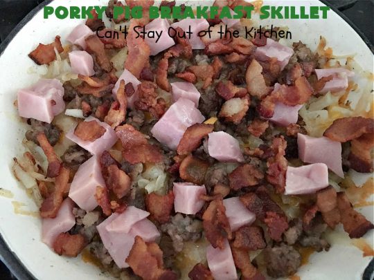 Porky Pig Breakfast Skillet | Can't Stay Out of the Kitchen | this hearty and amazing #BreakfastSkillet includes #eggs, "HashBrowns, two kinds of #cheese, #ham, #sausage & #bacon. It's absolutely the most mouthwatering #skillet #breakfast ever! If you enjoy hearty breakfasts, this one is amazing. #pork #SkilletBreakfast #PorkyPigBreakfastSkillet #Holiday #HolidayBreakfast