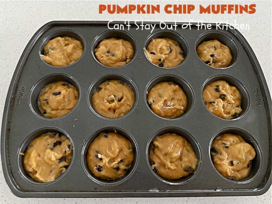 Pumpkin Chip Muffins | Can't Stay Out of the Kitchen | these glorious #PumpkinMuffins are lightly flavored with #cinnamon but are LOADED with #ChocolateChips! Every bite is so delicious you won't be able to stay out of them. Our company loved them! If you enjoy #pumpkin & #chocolate, you won't be able to stay out of them either! Great for #FallBaking, or a company or #holiday #breakfast or #brunch. #HolidayBreakfast #PumpkinChipMuffins #muffins #PumpkinChocolateChipMuffins