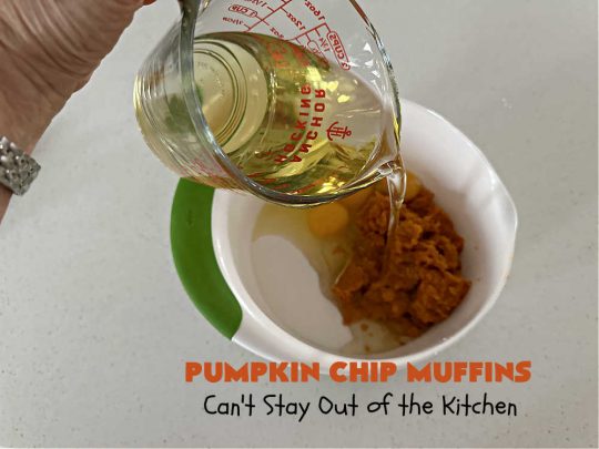 Pumpkin Chip Muffins | Can't Stay Out of the Kitchen | these glorious #PumpkinMuffins are lightly flavored with #cinnamon but are LOADED with #ChocolateChips! Every bite is so delicious you won't be able to stay out of them. Our company loved them! If you enjoy #pumpkin & #chocolate, you won't be able to stay out of them either! Great for #FallBaking, or a company or #holiday #breakfast or #brunch. #HolidayBreakfast #PumpkinChipMuffins #muffins #PumpkinChocolateChipMuffins