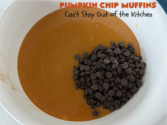 Pumpkin Chip Muffins | Can't Stay Out of the Kitchen | these glorious #PumpkinMuffins are lightly flavored with #cinnamon but are LOADED with #ChocolateChips! Every bite is so delicious you won't be able to stay out of them. Our company loved them! If you enjoy #pumpkin & #chocolate, you won't be able to stay out of them either! Great for #FallBaking, or a company or #holiday #breakfast or #brunch. #HolidayBreakfast #PumpkinChipMuffins #muffins #PumpkinChocolateChipMuffins