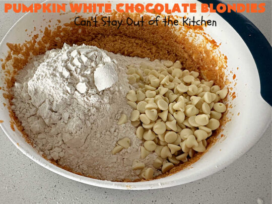 Pumpkin White Chocolate Blondies | Can't Stay Out of the Kitchen | these luscious #brownies include a #pumpkin base with #WhiteChocolateChips, #cinnamon, #nutmeg, #cloves, #ginger & #allspice. They're topped with a rich, decadent #icing on top. Perfect for #FallBaking, #tailgating, #Potlucks, #BackyardBarbecues or a #ChristmasCookieExchange. #cookies #chocolate #PumpkinWhiteChocolateBlondies