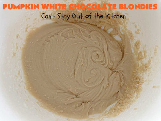 Pumpkin White Chocolate Blondies | Can't Stay Out of the Kitchen | these luscious #brownies include a #pumpkin base with #WhiteChocolateChips, #cinnamon, #nutmeg, #cloves, #ginger & #allspice. They're topped with a rich, decadent #icing on top. Perfect for #FallBaking, #tailgating, #Potlucks, #BackyardBarbecues or a #ChristmasCookieExchange. #cookies #chocolate #PumpkinWhiteChocolateBlondies