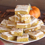 Pumpkin White Chocolate Blondies | Can't Stay Out of the Kitchen | these luscious #brownies include a #pumpkin base with #WhiteChocolateChips, #cinnamon, #nutmeg, #cloves, #ginger & #allspice. They're topped with a rich, decadent #icing on top. Perfect for #FallBaking, #tailgating, #Potlucks, #BackyardBarbecues or a #ChristmasCookieExchange. #cookies #chocolate #PumpkinWhiteChocolateBlondies