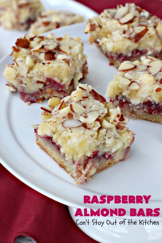 Raspberry Almond Bars | Can't Stay Out of the Kitchen | these irresistible #brownies are rich, decadent & absolutely sensational! They're perfect for #holiday & #Christmas #baking as they are so festive & beautiful. These layered #cookies use vanilla chips, #Raspberry preserves & #almonds. #holidaybaking #ChristmasCookieExchange #dessert #raspberrydessert