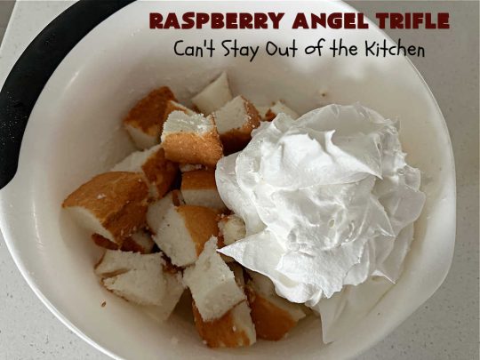 Raspberry Angel Trifle | Can't Stay Out of the Kitchen | this fantastic #RaspberryDessert will knock your socks off! It uses only 5 ingredients & can be whipped up in about 10 minutes. It's a festive, elegant Trifle #dessert that's excellent for #Christmas, #ValentinesDay, or other special occasions. Everyone will rave over it. #AngelFoodCake #CreamCheese #RaspberryPieFilling #RaspberryTrifleDessert #raspberries #RaspberryAngelTrifle