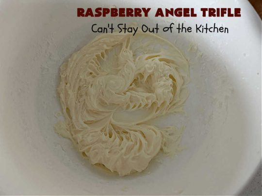 Raspberry Angel Trifle | Can't Stay Out of the Kitchen | this fantastic #RaspberryDessert will knock your socks off! It uses only 5 ingredients & can be whipped up in about 10 minutes. It's a festive, elegant Trifle #dessert that's excellent for #Christmas, #ValentinesDay, or other special occasions. Everyone will rave over it. #AngelFoodCake #CreamCheese #RaspberryPieFilling #RaspberryTrifleDessert #raspberries #RaspberryAngelTrifle