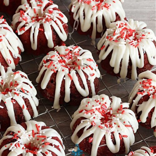 Red Velvet Cheesecake Tea Cakes | Can't Stay Out of the Kitchen | These delectable #TeaCakes start with a #RedVelvet cake mix that includes #Cheesecake pudding. They're glazed with #CreamCheese icing. Festive, elegant, beautiful #dessert for the #holidays, #Christmas or #ValentinesDay. #cake #chocolate #HolidayDessert #RedVelvetDessert #RedVelvetCheesecakeTeaCakesRed Velvet Cheesecake Tea Cakes | Can't Stay Out of the Kitchen | These delectable #TeaCakes start with a #RedVelvet cake mix that includes #Cheesecake pudding. They're glazed with #CreamCheese icing. Festive, elegant, beautiful #dessert for the #holidays, #Christmas or #ValentinesDay. #cake #chocolate #HolidayDessert #RedVelvetDessert #RedVelvetCheesecakeTeaCakes