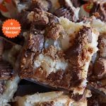 Reese's Peanut Butter Cup Ooey Gooey Bars | Can't Stay Out of the Kitchen | This fabulous #OoeyGooeyBar #recipe uses only 6 ingredients! It has a luscious #cheesecake filling & it's topped with #ReesesPeanutButterCups. Every bite will have you swooning! Great for #holiday #baking, #tailgating parties, a #ChristmasCookieExchange or any time you just need #chocolate! #PeanutButter #dessert #brownie #cookie #CreamCheese #ReesesPeanutButterCupOoeyGooeyBars