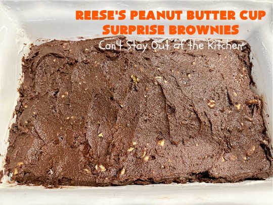 Reese's Peanut Butter Cup Surprise Brownies | Can't Stay Out of the Kitchen | These delectable #brownies have a wonderful "surprise" in each bite. A #ReesesPeanutButterCup is buried in each one. This fantastic over-the-top #dessert will have you swooning. Great for #tailgating parties, the #SuperBowl, #MarchMadness & other sporting events. #chocolate #PeanutButter #ReesesPeanutButterCupSurpriseBrownies