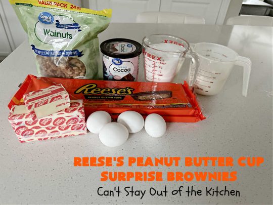Reese's Peanut Butter Cup Surprise Brownies | Can't Stay Out of the Kitchen | These delectable #brownies have a wonderful "surprise" in each bite. A #ReesesPeanutButterCup is buried in each one. This fantastic over-the-top #dessert will have you swooning. Great for #tailgating parties, the #SuperBowl, #MarchMadness & other sporting events. #chocolate #PeanutButter #ReesesPeanutButterCupSurpriseBrownies
