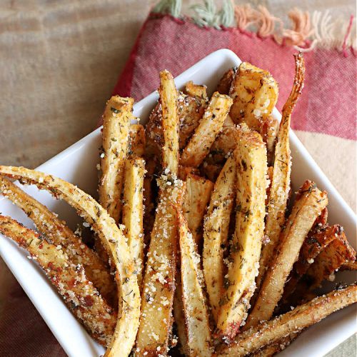 Roasted Parsnips | Can't Stay Out of the Kitchen | Roasting #parsnips is a great way to enjoy this #vegetable. Serve them with #RanchDressing, #BuffaloDip or ketchup. Excellent on any dinner menu or for #tailgating parties. Serve them just like you would #FrenchFries! These include #ParmesanCheese sprinkled over top. #RoastedParsnips #GlutenFree #healthy #LowCalorie