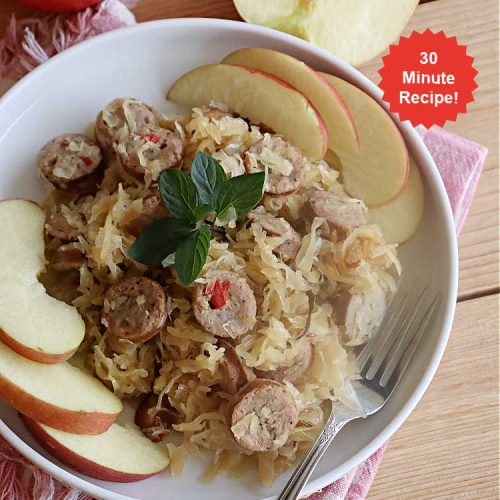 Sausage with Apple Sauerkraut | Can't Stay Out of the Kitchen | this is a terrific way to enjoy #PolishSausage, #apples & #sauerkraut especially if you need to get dinner on the table quickly. This #30MinuteRecipe is seasoned wonderfully with grated #apples, #AppleJuice, #CarawaySeed & #FennelSeed. The #onions are #caramelized quickly & make this #pork #entree even better. #GlutenFree #sausage #SausageWithAppleSauerkraut