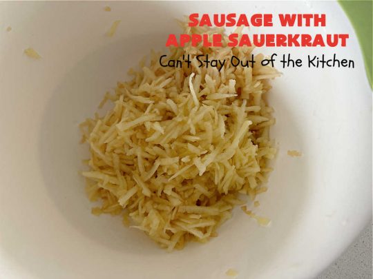 Sausage with Apple Sauerkraut | Can't Stay Out of the Kitchen | this is a terrific way to enjoy #PolishSausage, #apples & #sauerkraut especially if you need to get dinner on the table quickly. This #30MinuteRecipe is seasoned wonderfully with grated #apples, #AppleJuice, #CarawaySeed & #FennelSeed. The #onions are #caramelized quickly & make this #pork #entree even better. #GlutenFree #sausage #SausageWithAppleSauerkraut